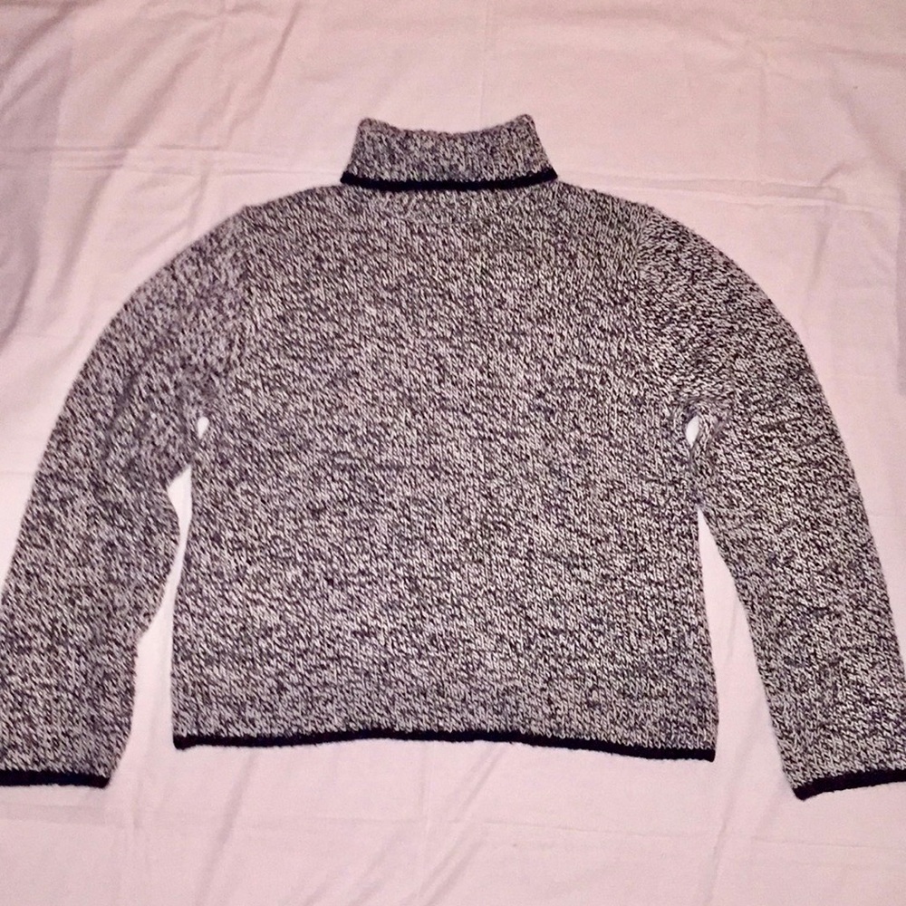 Black and white turtleneck sweater